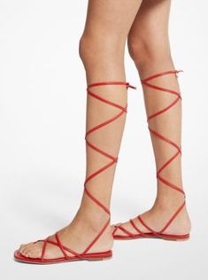 These barely-there lace-up sandals are a glamorous way to ground dresses and skirts. Crafted in Italy from smooth leather, they feature a flat sole for ease of wear. Spring Leather Lace-up Sandals With Flat Heel, Leather Lace-up Sandals With Flat Heel For Spring, Spring Leather Lace-up Flat Sandals, Leather Lace-up Flat Heel Sandals For Spring, Summer Lace-up Sandals With Leather Sole And Flat Heel, Spring Fitted Lace-up Sandals, Summer Ankle Strap Lace-up Sandals With Leather Sole, Strappy Lace-up Sandals With Leather Sole For Spring, Spring Beach Lace-up Sandals With Leather Sole