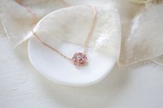 Beautifully detailed Rose gold CZ floral Bridal necklace is created with Rose Gold finish And premium cubic zirconia stones.Necklace measures 16 inches and extends to 18 inchesFlower measures 1/2" in diameterAvailable in two finishes, rose gold or rhodium (silver). FOR MATCHING PIECES SIMPLY TYPE "MORGAN" IN THE SEARCH BAR This is an original design by © Treasures by Agnes Delicate Rose Gold Diamond Necklace With Flower Pendant, Rose Gold Cubic Zirconia Necklace With Flower Pendant, Rose Gold Necklaces With Cubic Zirconia Flower Pendant, Rose Gold Flower-shaped Cubic Zirconia Necklaces, Rose Gold Round Flower Necklace For Wedding, Rose Gold Flower-shaped Cubic Zirconia Necklace, Rose Gold Flower Necklace For Wedding, Rose Gold Necklace With Flower Charm For Wedding, Delicate Rose Gold Bridal Necklace Gift