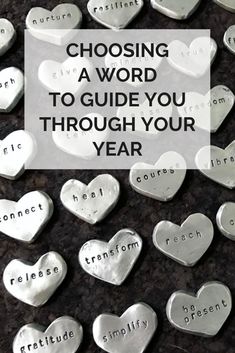 silver hearts with the words choosing a word to guide you through your year