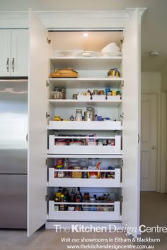 the kitchen pantry is full of food and condiments to keep it organized in