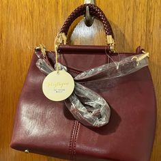 Never Used, Merlot Faux Leather Purse With Gray And White Striped Material Inside. Lots Of Pockets And Beautiful Details Like The Braided Straps. Matching Wallet Keychain With Crossbody Straps. Elegant Faux Leather Satchel Fashion Accessory, Elegant Burgundy Satchel With Zipper Closure, Wallet Keychain, Faux Leather Purse, Keychain Wallet, Lots Of Pockets, Braided Strap, Merlot, Leather Purse