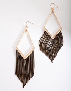 A hassle-free tassel look! A fun pair of fashion earrings are an easy way to spice up your daily ensembles! These earrings boast a black and gold-toned chain tassel design. Elevate a casual outfit with this essential must-have earring set. Composition: Gold-toned Colour: Black Style: Elevate a casual outfit with this essential must-have earring set! Occasion: Dinner out Care: Avoid direct contact with water, moisturisers and perfumes. Size: 12cm (L) Weight: 14.5g (one earring) | Lovisa Gold Blac Fashion Jewellery Online, One Earring, Bold Earrings, Black Chain, Accessories Jewelry Earrings, Favorite Rings, Hoodies For Sale, Tassel Earrings, Skirts For Sale