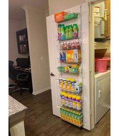 a refrigerator that is filled with drinks and other food items in it's storage area