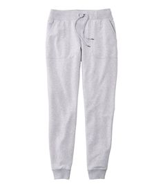 These jogger sweatpants live up to their name – in french terry that's smooth on the outside and softly looped on the inside for wonderful texture and remarkable comfort. The closer-fitting style works especially well with tunics and longer tops. Inseams: Regular 29". Petite 27". Favorite Fit: Sits lower on the waist. Slightly fitted through hip and thigh. Tapered-leg. In 95% cotton and 5% spandex. Machine wash and dry. Comfortable elastic waistband with adjustable drawstring. Side pockets and b Urban Fashion Trends, Casual Bottoms, Drawstring Jogger, Joggers Womens, Women Pants Casual, Jogger Sweatpants, Slim Legs, Workout Wear, L L Bean