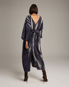 With a striking hand-chibori tie-dyed print, the Tie-Dye Silk Tunic dress features luminous silk that elegantly drapes along the body in this kimono-inspired silhouette. The luxurious material and relaxed fit make it easy to slip on and comfortable to wear throughout the day. Perfect for special events or elevated everyday elegance. 100% Silk Made in New York City Product Care: Dry Clean Only Silk Tunic Dress, Everyday Elegance, Silk Tunic, Silk Dyeing, Mid Dresses, Tie Dyed, Ethical Fashion, Fashion Company, Tunic Dress