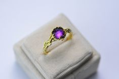 This unique ring is a beautiful expression of love, which you can give to yourself or your loved ones. Unique in design, it can be an engagement ring, promise ring, and accessory ring. Round Dome Cut Natural Amethyst Ring- Floral Shank Ring. Yellow Gold Plated Silver Ring. Unique Curved Floral Band. Engagement ring Amethyst Size:7mm Round cut Usually this ring gets delivered in up to 3-5 days in USA. Purple Bezel Set Birthstone Ring For Weddings, Dainty Purple Rings For Gifts, Purple Birthstone Ring With Prong Setting As Gift, Dainty Purple Crystal Ring For Gift, Gift Purple Ring With Bezel Setting, Purple Ruby Ring With Prong Setting As Gift, Handmade Purple Rings For Wedding, Dainty Amethyst Solitaire Ring As A Gift, Dainty Solitaire Amethyst Ring Gift