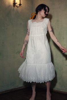 Vintage white cotton dress. Length: 95 cm. Bust: 45 cm. Waist: 40 cm. All measurements were taken flat. Model in the photo is 165 cm tall and wears a size S. Sleeveless Broderie Anglaise Cotton Dress, Sleeveless Cotton Dress With Broderie Anglaise, Cotton Midi Dress With Broderie Anglaise For Daywear, Fitted Cotton Broderie Anglaise Dress, Sleeveless White Dress With Broderie Anglaise, Broderie Anglaise Sundress For Daywear, Fitted Cotton Midi Dress With Broderie Anglaise, Sleeveless Broderie Anglaise Midi Dress For Daywear, White Cotton Dress With Broderie Anglaise