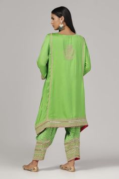 Green silk chanderi kurta with zari and aari embroidery. Comes with salwar. - Aza Fashions Dola Silk Kurta With Gota Work, Dola Silk Kurta With Gota Work In Traditional Drape, Traditional Silk Sets With Zari Work, Silk Sets With Zari Work In Traditional Drape, Traditional Drape Silk Sets With Zari Work, Silk Traditional Wear With Gota Work For Festivals, Festival Silk Kurta With Cutdana, Silk Kurta With Cutdana For Festivals, Pista Green Raw Silk Kurta With Resham Embroidery