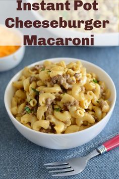 a white bowl filled with cheeseburger macaroni on top of a blue table