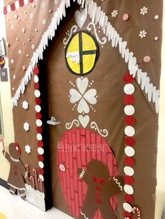 a door decorated with gingerbreads and decorations