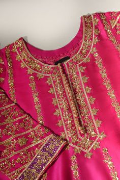 This beautiful three piece is designed on pure fuschia raw silk heavily embellished with pretty hand gotah zardosi ( handwork/ada ) details. Paired with a regal tye dye pure  dupatta with fuchsia pure chundri dupatta with goti phool spray. The length of the panelled pishwas is 48 inches. An alluring three piece for you Ada Work Designs, Zardosi Embroidery Neck Designs, Goti Design Dresses, Silk Embroidery Suits, Baby Fancy Dress, Embroidery Store, Fashion Dresses Formal, Bollywood Dress, Embroidered Suit