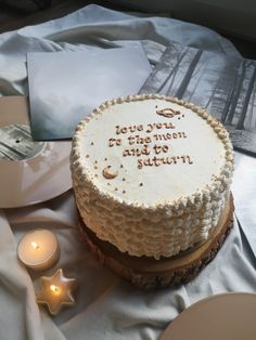 there is a cake on the table with candles