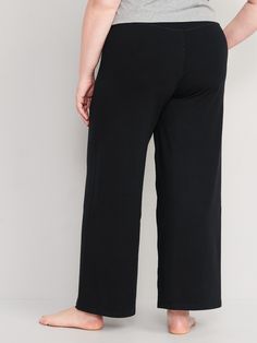 hidden on-seam pocket fits your phone go-dry wicks moisture breathable extra high waist is 1" higher than standard high rise sits above belly button relaxed hip and thigh hits below ankle 31 1/2" regular inseam 29" petite inseam 35 1/2" tall inseam models are approx.  5'9" and wear sizes s (4), l (12), and xl (18)machine wash according to the care instruction label cotton 53% spandex 12% polyester 22% TENCEL™ modal 13% Solid Moisture-wicking Bottoms With 5-inch Inseam, Wide Leg Activewear With Pockets And 4-way Stretch, High Waist Bottoms With Comfort Waistband For Work, Comfort Waistband Black Yoga Bottoms, Black Yoga Bottoms With Comfort Waistband, Black Bottoms With Comfort Waistband For Yoga, Solid High Waist Yoga Pants With 4-way Stretch, Solid Color High Waist Yoga Pants With 4-way Stretch, Solid Color High Waist 4-way Stretch Yoga Pants