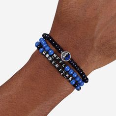 A whole new way to rep the team in style is here. Step up your fan fashion sense with this Dallas Mavericks 3 Pack Beaded Friendship Bracelet. These matching friendship bracelets have an all-over team-colored design and team logo displays, which makes them the perfect way to show your support for the Dallas Mavericks on gamedays and every day in between. Every bead bracelet design is the perfect addition to your outfit, whether you’re heading to the game, watching at home, or just hanging out wi Blue Adjustable Beaded Bracelets For Team Spirit, Casual Personalized Beaded Bracelets For Fans, Casual Adjustable Wristband For Fan Merchandise, Casual Blue Jewelry For Game Day, Matching Friendship Bracelets, Cool Friendship Bracelets, Friendship Bracelets With Beads, Fan Fashion, Beads Bracelet Design