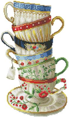 a cross stitch pattern of stacked tea cups and saucers with tassels on them