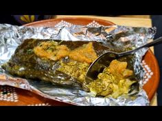 an image of food wrapped in foil on a plate