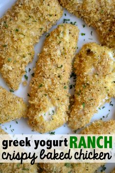 chicken tenders on a white plate with the words, greek yogurt ranch crispy baked chicken