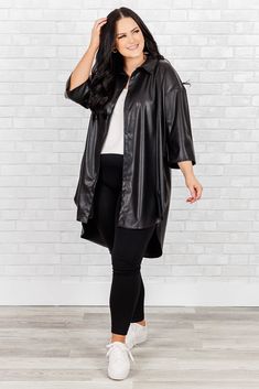 We speak the truth when we say you would AMAZING in this top! With the ability to be worn open over a solid top and leggings for a lightweight jacket look, or buttoned up with skinnies and accessories for a classic style, this top offers endless possibilities! Its timeless black color adds a touch of sophistication to any outfit! 100% Polyester Versatile Black Blouse For Fall, Black Versatile Blouse With Button Closure, Versatile Black Fall Blouse, Versatile Black Button-up Blouse, Sleek Button-up Tops For Fall, Sleek Button-up Fall Tops, Sleek Fall Button-up Tops, Black Button-up Blouse For Layering, Edgy Tops For Workwear In Fall