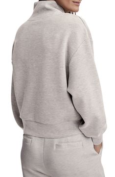 Get into your flow in this lightweight sweatshirt featuring woven two-way-stretch fabric and a quarter-zip placket. 22 1/2" length (size Medium) Stand collar 72% viscose, 23% polyester, 5% elastane Machine wash, dry flat Imported