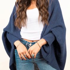 Stay Warm Without Giving Up Your Cool Style With This Soft Knit Shrug Cardigan. Perfect For Cold Weather, This One-Of-A-Kind Piece Will Keep You Looking Great And Feeling Cozy All Winter Long! 100% Acrylic Soft Striped Knit Long Sleeves Approx. 30" Long (Total, Front) X 52" Wide (Total, Front) Hand Wash Cold Do Not Tumble Dry Do Not Iron One Size Fits Most Blue Knit Outerwear For Fall, Blue Knitted Cardigan For Fall, Trendy Blue Knitted Cardigan, Blue Cozy Cardigan For Fall, Cozy Blue Cardigan For Fall, Cozy Blue Sweater Coat For Layering, Blue Soft Knit Cardigan, Trendy Blue Knit Cardigan, Blue Oversized Sweater Coat