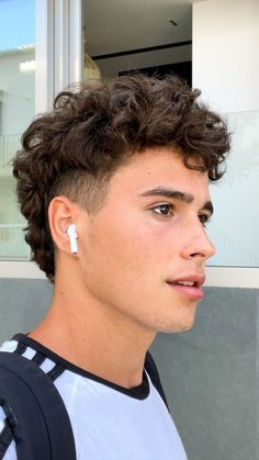 Curly Wavy Hair Men Haircut, Men Haircut Mullet Fade, Curly Hair Mullets On Men, Mullet For Wavy Hair Men, Faded Mullet Curly Hair, Wavy Hairstyles Men Fade, Mens Short Mullet Fade Curly, Mens Taper Fade Mullet, Mullet Hairstyle Curly Hair Men