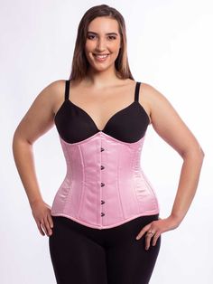 Picture your curves in our hourglass corset! Designed in a beautiful satin for those who have a high degree of natural curve, the CS-426 Longline underbust steel boned waist trainer is made with a contoured underbust line that is curved to fit directly under the bust and is longer in the torso than our standard length corsets. Available in many colors, the pink, white, gray and black fabrics are a silky smooth satin and the maroon is a staff favorite, resembling a duo-tone maroon and black color Pink Waist Corset, Pink Corset Plus Size, Pink Fitted Underwire Corset, Fitted Underbust Pink Corset, Pink Underbust Feminine Corset, Orchard Corset, Black Fabrics, Plus Size Satin, Waist Trainers