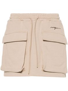 beige cotton jersey texture embroidered logo to the front slip pockets to the sides two front cargo pockets thigh-length elasticated drawstring waistband straight hem French terry lining Beige Cotton Cargo Skirt With Pockets, Logo Jersey, Airport Fashion, Straight Skirt, Drawstring Waistband, French Terry, Mini Skirt, Womens Bottoms, Fashion Branding