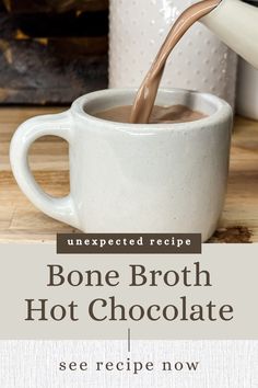 bone broth hot chocolate is being poured into a white mug with the words, unexpected recipe