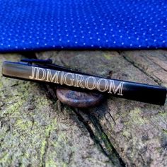 Elevate your groomsmen's style with our Groomsmen Tie Clip. Crafted with precision, this sleek accessory adds a touch of sophistication to any ensemble. Personalize each tie clip with names or initials, creating a unique and thoughtful gift. Perfect for weddings or formal occasions, it's a timeless keepsake that enhances their dapper look. Features: Handmade Materials: Stainless Steel, Laser Engraving Measures: 2.25" Length Tie Clips For Men Wedding, Groomsmen Tie Clip, Personalized Tie Clip, Christmas Stocking Gifts, Groomsmen Ties, Tie Bar Clip, Stocking Gifts, Gift Business, Business Gifts