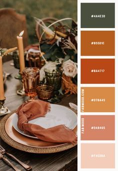 the table is set with candles, plates and utensils for an autumn dinner