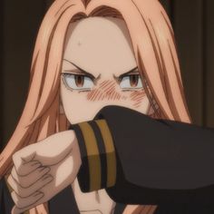 an anime character with long blonde hair pointing at something