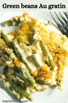 green beans and gratine casserole on a white plate with a fork