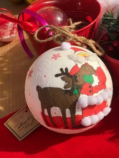 a christmas ornament with a reindeer on it