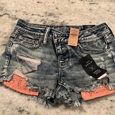 New With Tags Never Been Worn Distressed Denim With Coral Detailing Around Pockets Super Stretch Size 4 Orange Denim Bottoms For Spring, Spring Orange Denim Bottoms, Casual Orange Summer Jeans, Stretch Shorts, Distressed Denim, Blue Orange, Jean Shorts, American Eagle Outfitters, American Eagle