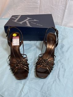 Elevate your formal look with these Anne Klein copper brown strappy heels. Made with synthetic materials and a sturdy heel, they are perfect for dancing the night away. The size 7.5 is true to fit and will give you a comfortable and confident stride. The rich brown color complements any formal outfit, making them a versatile addition to your wardrobe. Get ready to turn heads at your next event with these stunning Anne Klein heels. Brown Strappy Heels, Copper Brown, Color Complement, Brown Heels, Synthetic Materials, Outfit Making, Formal Outfit, Formal Looks, Strappy Heels