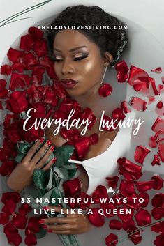 a woman holding roses in her hands with the words, everyday luxury 35 masterful ways to live like a queen