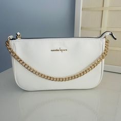 Nanette Lepore New Without Tags White Handbag. White Pouch Shoulder Bag With Zipper Closure, White Clutch Shoulder Bag With Removable Pouch, Everyday White Pouch Shoulder Bag, White Everyday Bag With Chain Strap, White Everyday Bags With Chain Strap, White Bags With Chain Strap For Daily Use, White Clutch Shoulder Bag For Travel, White Travel Clutch Bag, White Clutch Shoulder Bag For Daily Use