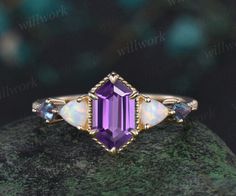 - Metal: Solid gold(10K/14K/18K white, yellow, rose gold available), 925 sterling silver,platinum.- Main Stone: 5x9mm long Hexagon natural amethyst- Accent Stone: Lab opals and kite lab alexandrite- Band Width: 1.4mm- Can be personalized : Yes Elegant Emerald Cut Opal Ring, Elegant Emerald-cut Opal Ring Gift, Elegant Emerald Cut Opal Ring Gift, Elegant Purple Opal Ring For Anniversary, Elegant Purple Opal Anniversary Ring, Engagement Ring Yellow Gold, Amethyst Engagement Ring, Engagement Ring Yellow, Topaz Birthstone