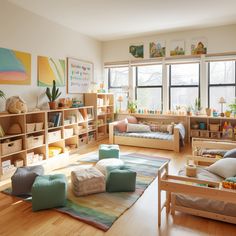 a living room filled with lots of furniture and bookshelves on top of hard wood floors