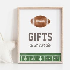 a wooden frame with a football on it and the words gifts and cards written below