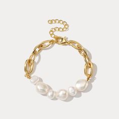 Adorn your wrist with the exquisite Baroque Pearl Bracelet, crafted from freshwater pearls of the highest quality. This timeless piece of jewelry radiates beauty and elegance, making it the perfect addition to any outfit and a must-have for your jewelry collection. DETAILS Plating: 18k Gold on Brass Materials:   18K Gold on Brass, Freshwater Pearl Measurements: Length: 6.69"(17cm) + Extender: 2.36"(6.0cm) Weight:  15.05g Note: It will be in stock in 7 business days! Luxury Baroque Pearl Bracelet With Pendant, Luxury Baroque Pearl Charm Bracelets, Luxury Baroque Pearl Charm Bracelet, Luxury Baroque Pearl Bracelet With Oyster Design, Luxury Baroque Pearl Bracelet, Luxury Elegant Baroque Pearl Bracelet, Diamond Star Necklace, Star And Moon Necklace, Diamond Evil Eye