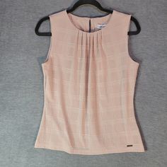 Stretchy Soft Fabric, Rear Neck Button In Gold. Professional Style. Size Small Color Blush Condition New With Tags Flaws No See Photos For Measurements. All Items Come From A Smoke-Free Facility. Each Piece Is Stored, Packaged And Shipped With Care. Shipping Happens Next Business Day, Except Tuesdays (All Monday Sales Will Ship Wednesday) Pink Tank Top For Summer Workwear, Pink Sleeveless Top For Work, Chic Pink Tank Blouse, Elegant Sleeveless Pink Blouse, Pink Feminine Tank Blouse, Feminine Pink Tank Blouse, Pink Sleeveless Blouse For Work, Pink Feminine Sleeveless Blouse, Feminine Sleeveless Blouse Tank Top For Work