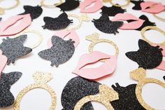 black and pink paper cut outs with gold glitter