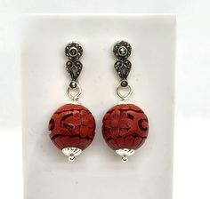 Here's a really distinctive pair of sterling silver earrings featuring vivid red Cinnabar beads. Each dangling 15 mm sphere is deeply carved with lovely floral motifs, accented by sparkling marcasites. They hang from vintage sterling silver tops with 14 karat yellow gold posts. Sterling silver friction backs are included. Each earring measures 40 mm from top to bottom (or about 1 & 5/8th inches). These are completely unique and one-of-a-kind!  ~ This will arrive at your house Gift Boxed, ready to giftwrap or wear! ~ you can also find, LIKE & follow Squidnuggets on Instagram for first looks at new work!! Red Sterling Silver Filigree Earrings, Red Filigree Dangle Earrings, Traditional Red Filigree Earrings, Red Filigree Drop Earrings, Unique Red Earrings For Formal Events, Unique Red Earrings For Formal Occasions, Traditional Red Sterling Silver Earrings, House Gift Box, Akoya Pearl Necklace