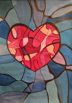 a stained glass window with a heart in the center