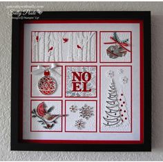 a red and white framed christmas card with ornaments on the front, no ef