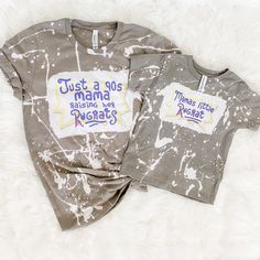 two t - shirts that say just a 90's mama and raising her rights