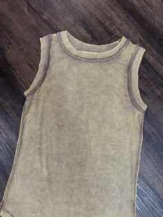 The perfect tank is now in! Featuring a mocha acid wash color, ribbed material and scoop neck, these tanks are perfect to layer under dresses or wear by it by itself! Color: Mocha Ribbed Material Scoop Neck Tank Top 95% Rayon 5% Spandex Fall Candle Decor, Athletic Skirts, Kids Beanies, Scoop Neck Tank Top, Vests Mens, Under Dress, Acid Wash, Ribbed Tank Tops, Mocha