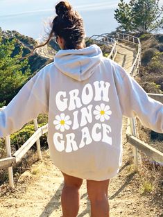 "♥ Hello and Welcome to Meaningful Tees Shop! ♥ Spread a Positive Message of Faith with this super trendy, cute and comfy \"Grow In Grace\" Back Print Hoodie! ♥ Printed on the most popular Unisex Hoodie, the Gildan 18500 is 50% Cotton / 50% Poly. The soft fleece lining makes it super Comfy and is sure to become your new favorite! ♥ All of our items are made to order with care for each customer : ) ♥ Please allow 3-7 BUSINESS days (usually 3-5) for your item to be created PLUS shipping time via U Have A Good Day Hoodie, Happy Hoodie, Aesthetic Hoodie, Preppy Aesthetic, Have A Good Day, What Makes You Happy, Baddie Outfits, Carolina Blue, Outfits Ideas