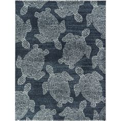 a blue rug with turtles on it